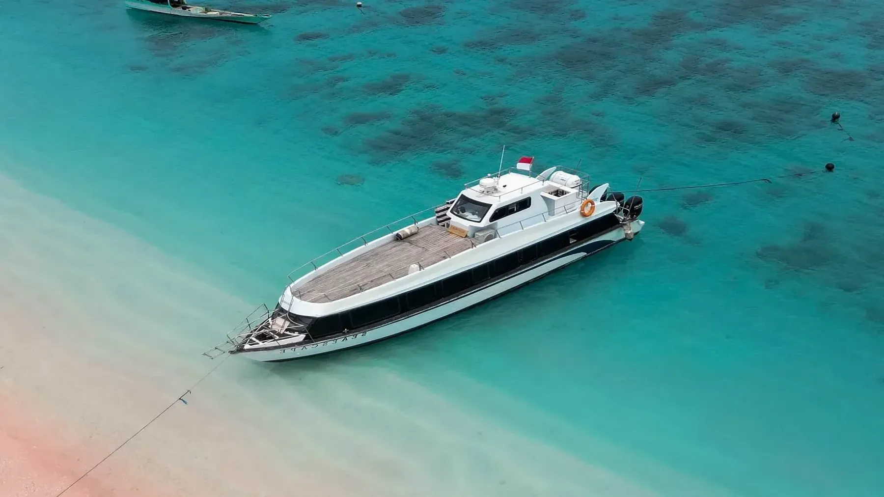A charter vessel underway off the Lombok coast