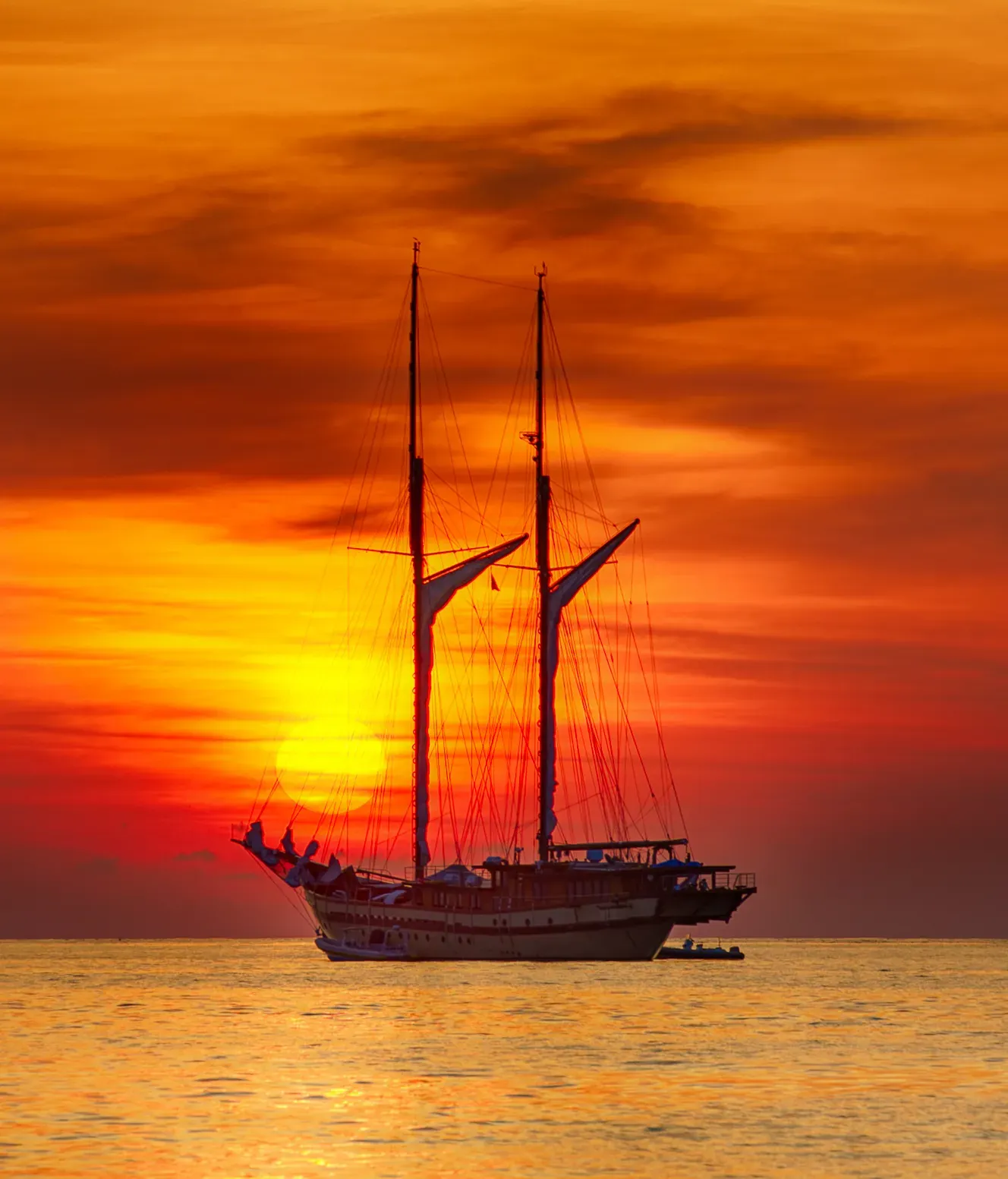 Sunset over the water from a chartered vessel in Indonesia