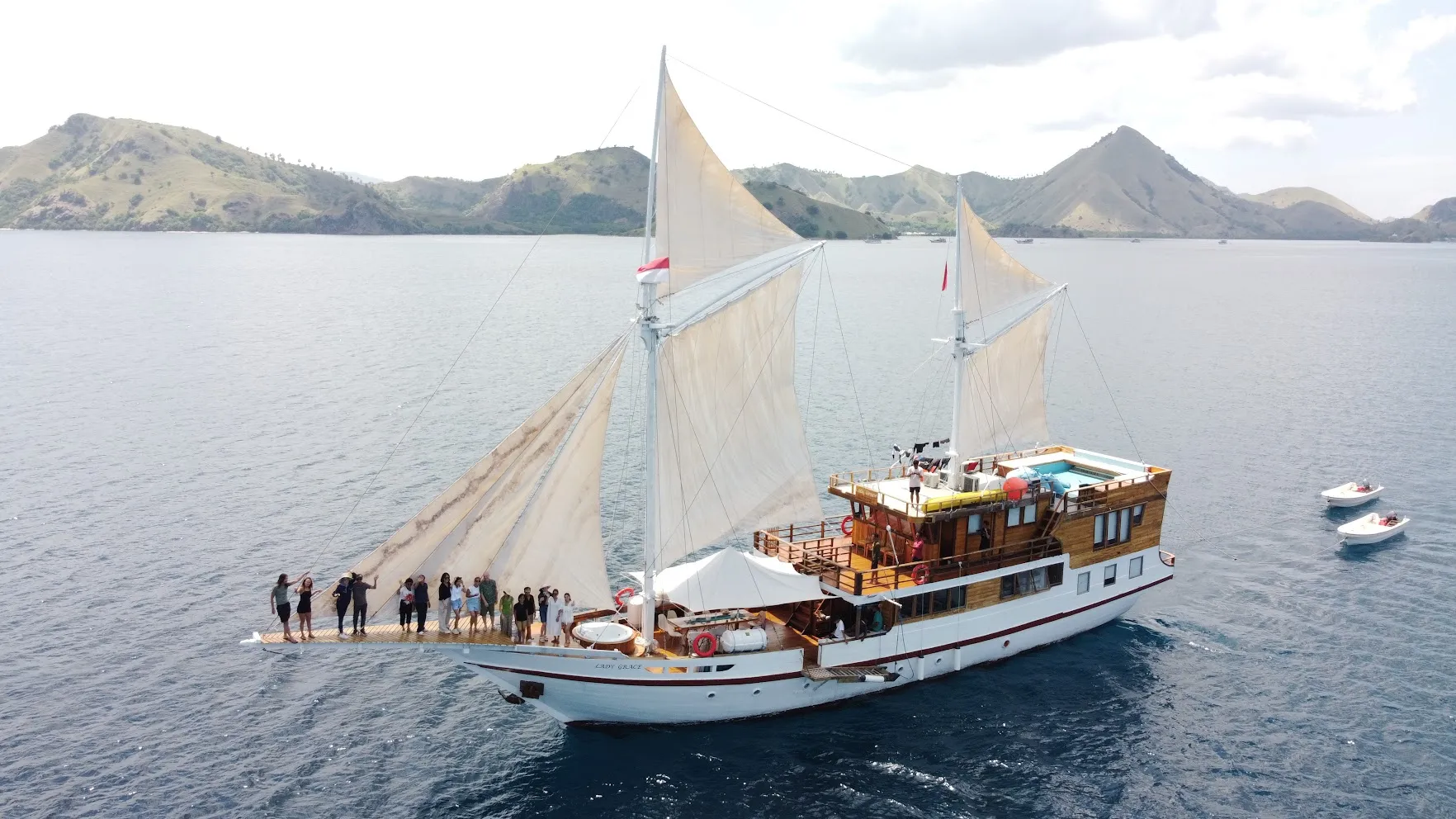 The wooden phinisi we charter on the Lombok routes, seen from the water